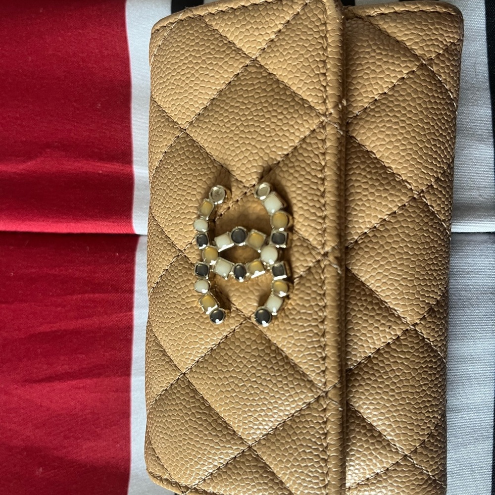 Chanel tan folded wallet gem stone logo
